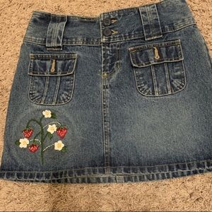Embroidered jean skirt.